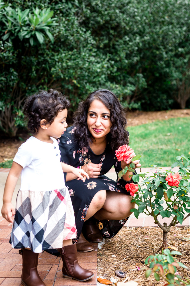 Plano Family Photographer at family session in Dallas Arboretum with roses