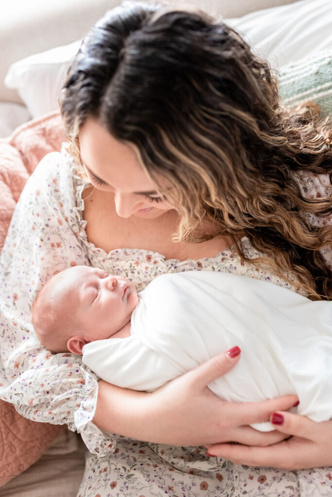 Best Newborn Photographer in Frisco takes pictures of mom and baby